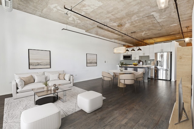 6 S Laflin St Unit 607, Chicago, IL 60607 - living room featuring dark wood finished floors and baseboards