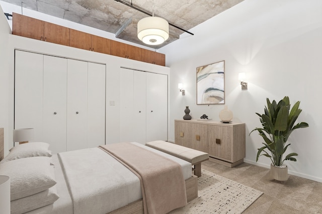 6 S Laflin St Unit 607, Chicago, IL 60607 - bedroom with multiple closets and light colored carpet