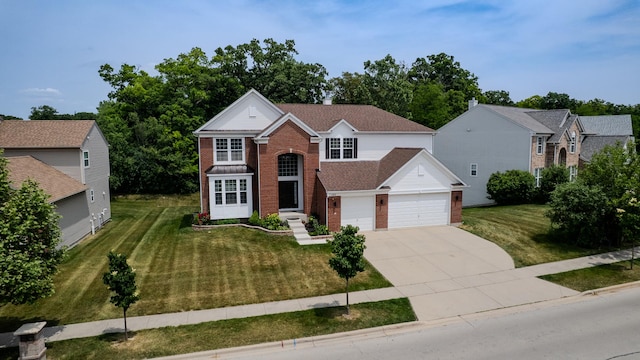 105 Black Hill Dr, Streamwood, IL 60107 - traditional-style home with brick siding, concrete driveway, and a front lawn