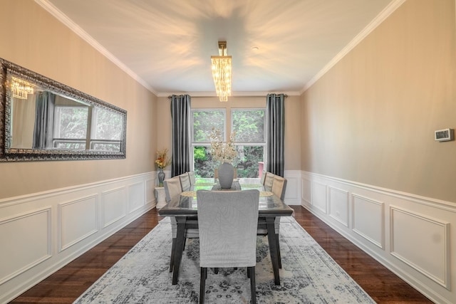 105 Black Hill Dr, Streamwood, IL 60107 - dining area featuring ornamental molding, dark wood-style flooring, wainscoting, a decorative wall, and a chandelier
