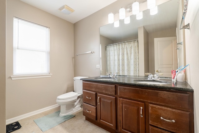 105 Black Hill Dr, Streamwood, IL 60107 - bathroom featuring double vanity, tile patterned flooring, and a shower with shower curtain