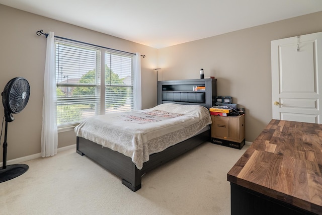 105 Black Hill Dr, Streamwood, IL 60107 - bedroom with light colored carpet and baseboards