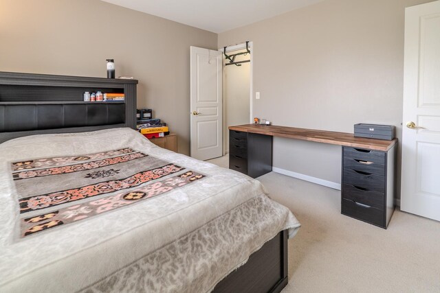 105 Black Hill Dr, Streamwood, IL 60107 - bedroom featuring light carpet and baseboards