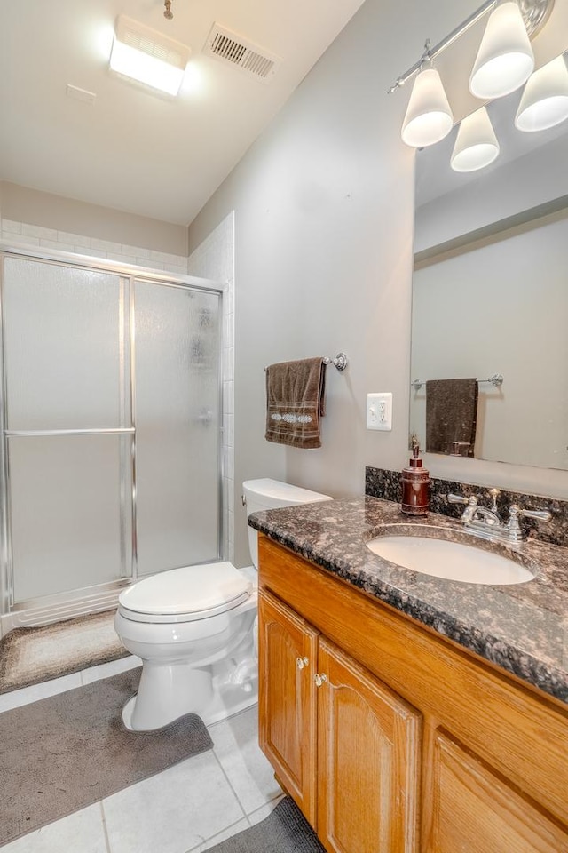 105 Black Hill Dr, Streamwood, IL 60107 - full bathroom featuring vanity, a shower stall, and tile patterned flooring
