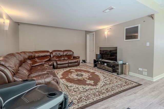 105 Black Hill Dr, Streamwood, IL 60107 - living area featuring wood finished floors and baseboards