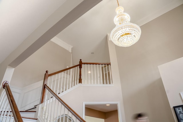 105 Black Hill Dr, Streamwood, IL 60107 - stairway featuring a chandelier and a high ceiling