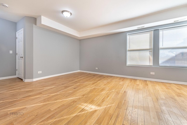 4752 N Albany Ave Unit 3, Chicago, IL 60625 - unfurnished room featuring light wood-style floors and a smoke detector
