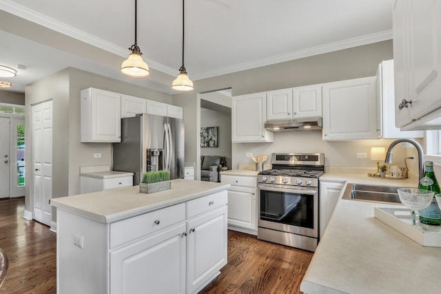 1312 Dorchester Dr, Mundelein, IL 60060 - kitchen featuring stainless steel appliances, under cabinet range hood, dark wood finished floors, light countertops, and crown molding