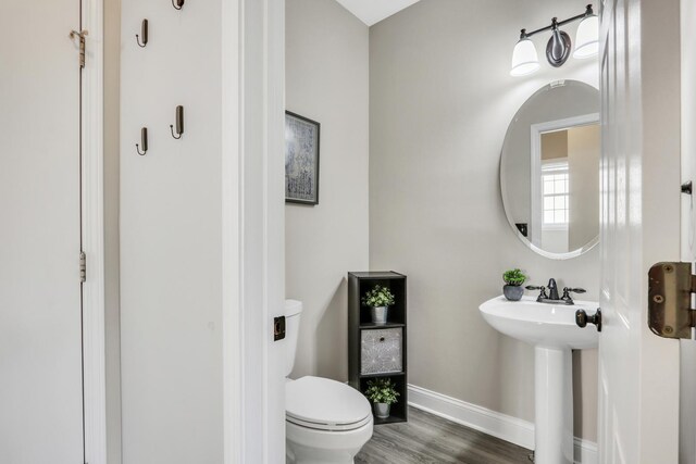 1312 Dorchester Dr, Mundelein, IL 60060 - half bath with toilet and wood finished floors
