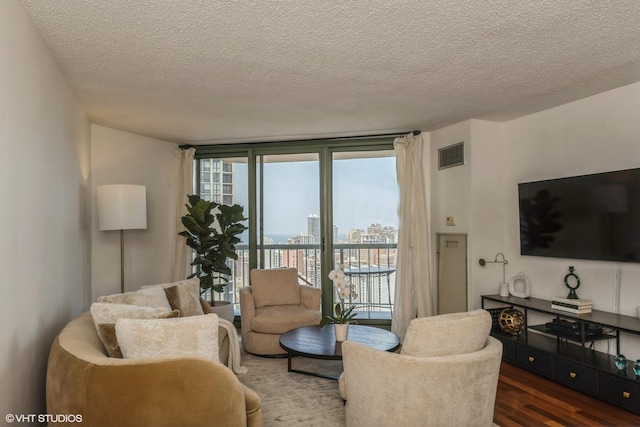 111 W Maple St Unit 2803, Chicago, IL 60610 - living area with wood finished floors and a textured ceiling