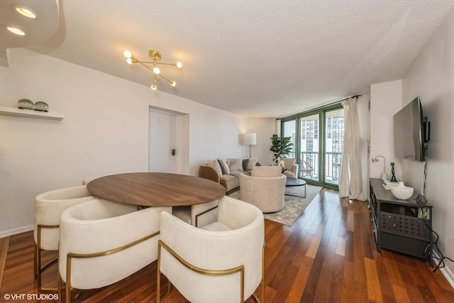 111 W Maple St Unit 2803, Chicago, IL 60610 - dining space featuring dark wood-style flooring and a textured ceiling