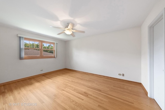 7769 Danbury Dr, Darien, IL 60561 - unfurnished room featuring ceiling fan and light wood-type flooring