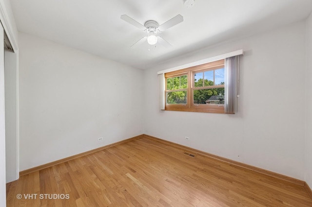 7769 Danbury Dr, Darien, IL 60561 - unfurnished room with light wood finished floors and a ceiling fan