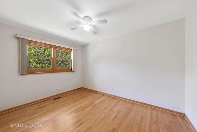 7769 Danbury Dr, Darien, IL 60561 - spare room with ceiling fan and light wood-style floors
