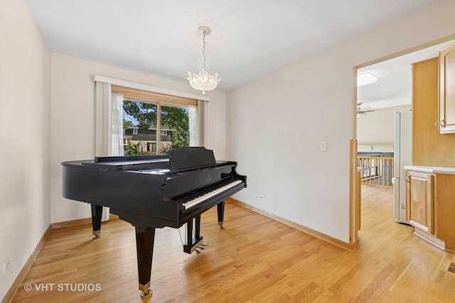 7769 Danbury Dr, Darien, IL 60561 - living area with a chandelier and light wood-type flooring