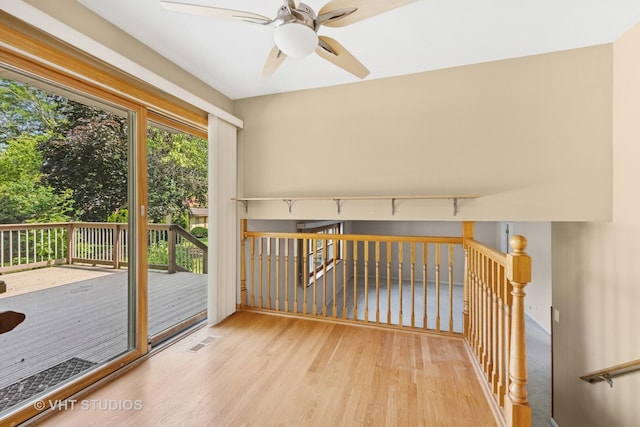 7769 Danbury Dr, Darien, IL 60561 - doorway featuring wood finished floors and a ceiling fan