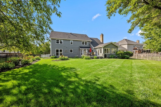342 Dilorenzo Dr, Naperville, IL 60565 - back of house featuring a fenced backyard and a chimney