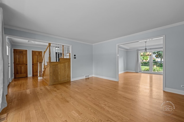 342 Dilorenzo Dr, Naperville, IL 60565 - unfurnished living room with light wood-type flooring, a chandelier, ornamental molding, and stairs