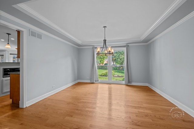 342 Dilorenzo Dr, Naperville, IL 60565 - empty room with light wood-type flooring, a chandelier, and ornamental molding