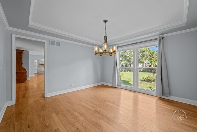342 Dilorenzo Dr, Naperville, IL 60565 - unfurnished room featuring a tray ceiling, a chandelier, crown molding, and light wood-type flooring