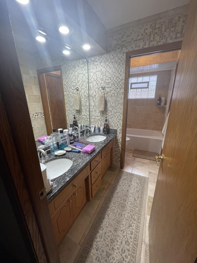 10752 S S Ave E, Chicago, IL 60617 - bathroom featuring double vanity, tile patterned floors, and tub / shower combination