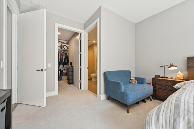1701 W Webster Ave Unit 512, Chicago, IL 60614 - bedroom featuring light carpet and ensuite bathroom