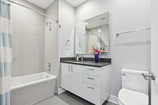 1701 W Webster Ave Unit 512, Chicago, IL 60614 - bathroom featuring tiled shower / bath, vanity, and tile patterned flooring