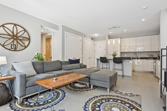 1701 W Webster Ave Unit 512, Chicago, IL 60614 - living room featuring light wood finished floors and recessed lighting