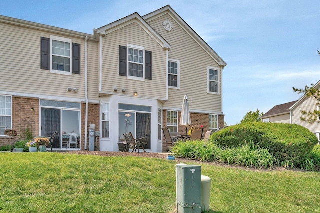 5011 Elmira Ct, Plainfield, IL 60586 - back of property with brick siding and a yard