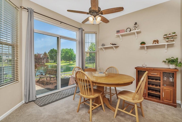 5011 Elmira Ct, Plainfield, IL 60586 - carpeted dining room with ceiling fan and a water view
