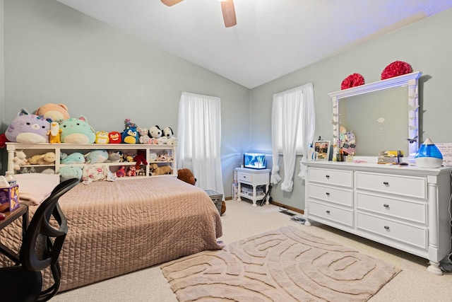 5555 Raspberry Trl, Rockford, IL 61114 - bedroom featuring light carpet, vaulted ceiling, and a ceiling fan