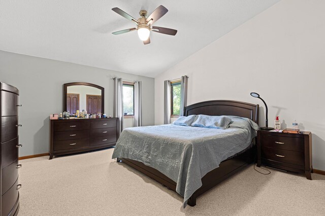 5555 Raspberry Trl, Rockford, IL 61114 - bedroom with lofted ceiling, light carpet, and ceiling fan