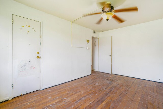 17 Michael Rd, Park Forest, IL 60466 - spare room featuring wood-type flooring and ceiling fan