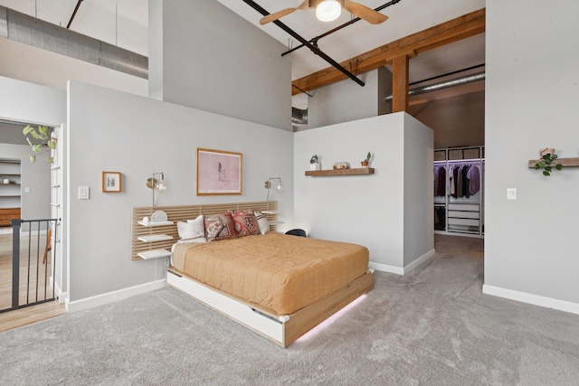 2511 W Moffat St Unit 501, Chicago, IL 60647 - bedroom featuring a high ceiling, carpet, a spacious closet, and a closet