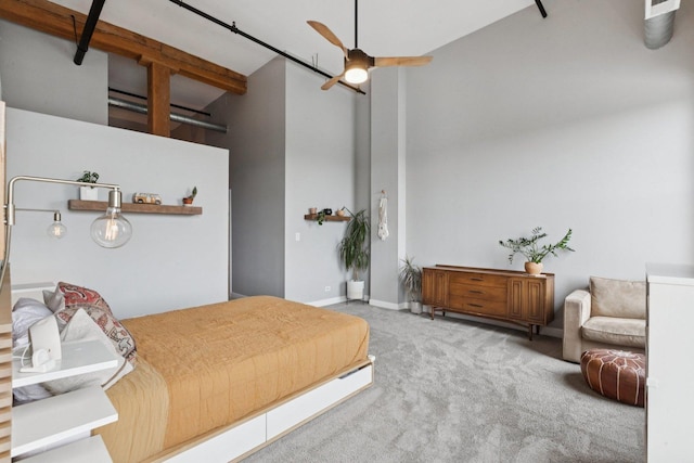 2511 W Moffat St Unit 501, Chicago, IL 60647 - carpeted bedroom featuring a towering ceiling and baseboards
