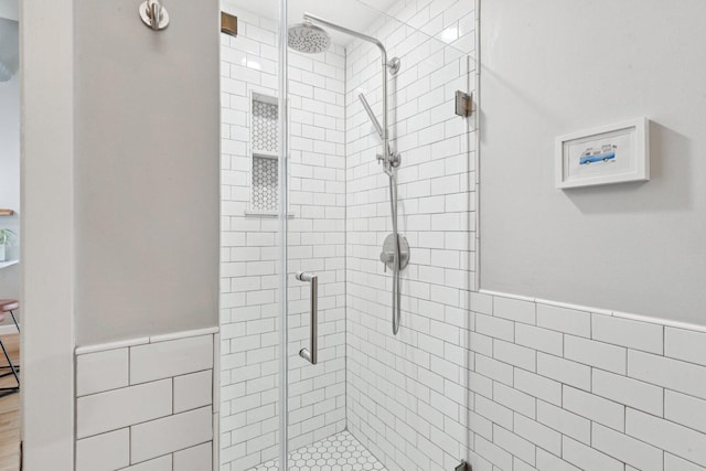 2511 W Moffat St Unit 501, Chicago, IL 60647 - full bathroom with a stall shower, tile walls, and a wainscoted wall