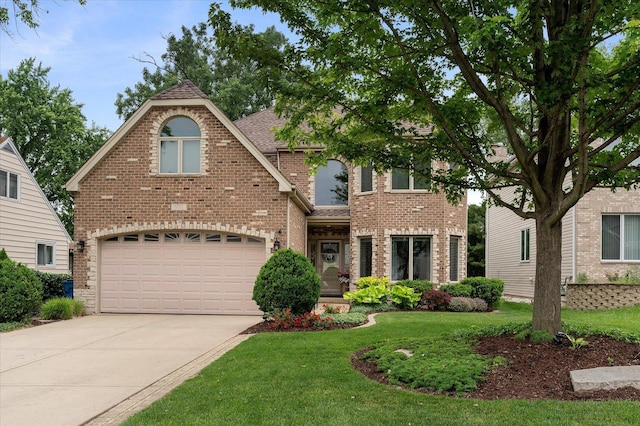 601 W Crockett Ave, Elmhurst, IL 60126 - view of front of home featuring brick siding, driveway, a front lawn, an attached garage, and roof with shingles