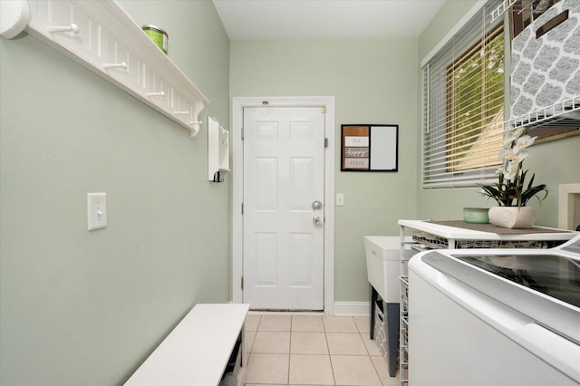 601 W Crockett Ave, Elmhurst, IL 60126 - laundry room with independent washer and dryer and light tile patterned floors