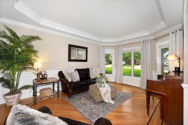 601 W Crockett Ave, Elmhurst, IL 60126 - living area featuring ornamental molding, light wood-style flooring, and a raised ceiling