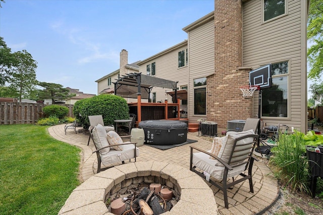601 W Crockett Ave, Elmhurst, IL 60126 - view of patio / terrace with an outdoor fire pit, a pergola, and a hot tub