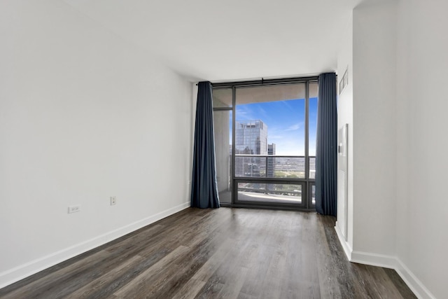 100 E 14th St Unit 2007, Chicago, IL 60605 - spare room featuring wood finished floors and floor to ceiling windows