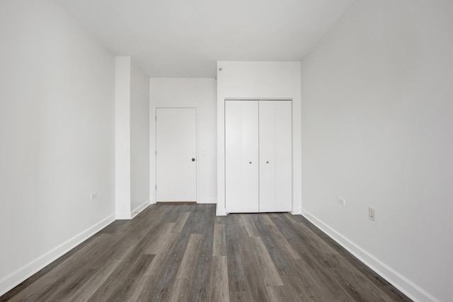 100 E 14th St Unit 2007, Chicago, IL 60605 - unfurnished bedroom featuring wood finished floors and a closet