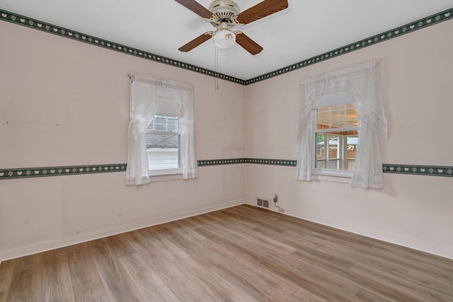 505 Douglas St, Morris, IL 60450 - spare room with wood finished floors and ceiling fan