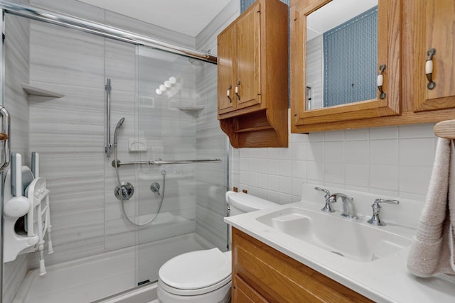 505 Douglas St, Morris, IL 60450 - bathroom with tasteful backsplash, a stall shower, vanity, and tile walls