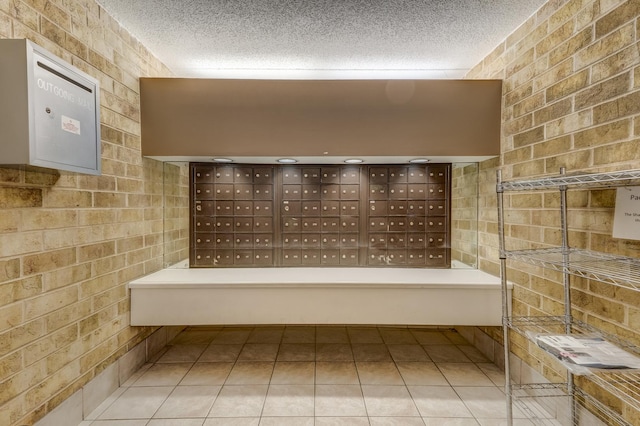 5550 Astor Ln Unit 214, Rolling Meadows, IL 60008 - surrounding community featuring mail area and a textured ceiling