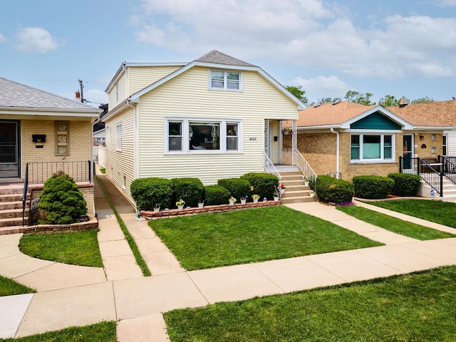 4130 N Oketo Ave, Norridge, IL 60706 - bungalow-style home featuring a front yard and brick siding