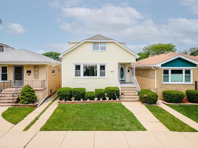 4130 N Oketo Ave, Norridge, IL 60706 - bungalow featuring a porch and a front yard