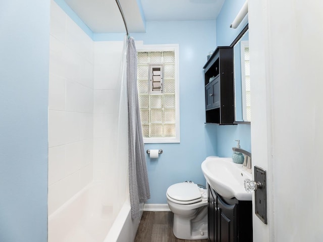 4130 N Oketo Ave, Norridge, IL 60706 - full bathroom featuring vanity, wood finished floors, and shower / tub combo