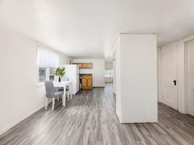4130 N Oketo Ave, Norridge, IL 60706 - kitchen with freestanding refrigerator and light wood-style floors