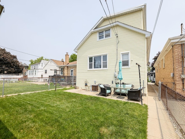 4130 N Oketo Ave, Norridge, IL 60706 - back of property with a patio area and a fenced backyard
